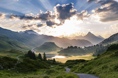 Scenic view of mountains against sky during sunset