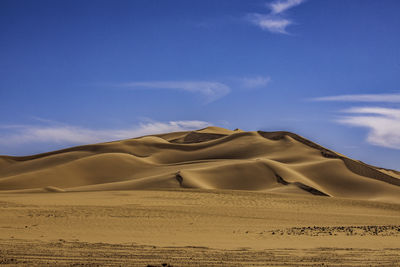 Scenic view of desert against sky