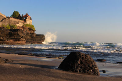 Scenic view of sea against clear sky