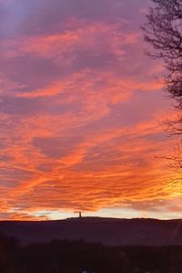 Scenic view of dramatic sky during sunset