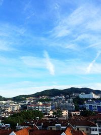 Cityscape against blue sky