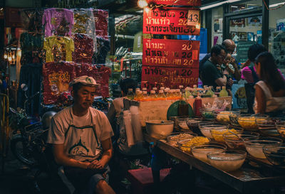 People at market stall