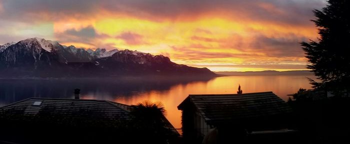Scenic view of lake at sunset