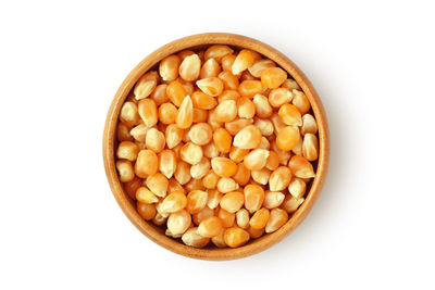 High angle view of eggs in bowl against white background