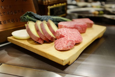 Close-up of sushi on cutting board