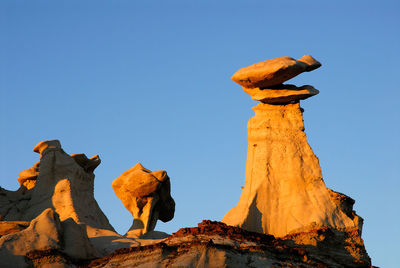 Low angle view of built structure against clear blue sky