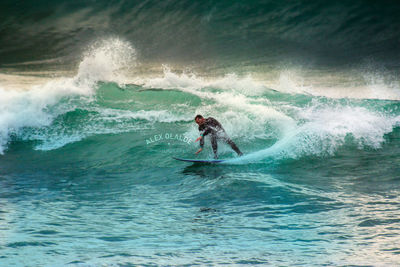 Man surfing in sea