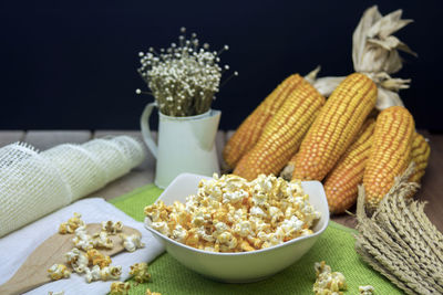 Close-up of popcorn in bowl on table