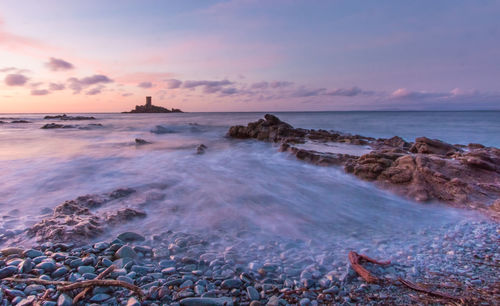 Scenic view of sea against sky during sunset