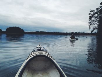 Scenic view of boats in lake