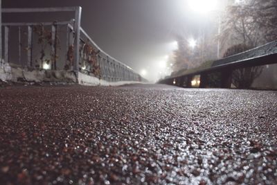 Surface level of road on bridge at night