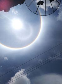 Low angle view of bright sun