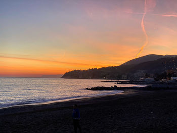 Scenic view of sea against sky during sunset