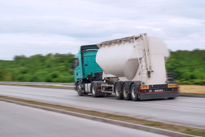 View of traffic on highway against sky