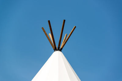 High section teepee against clear sky