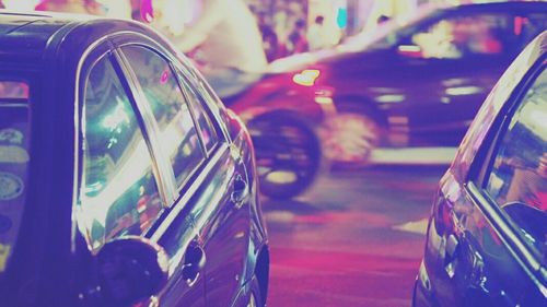 View of black cars parked on street