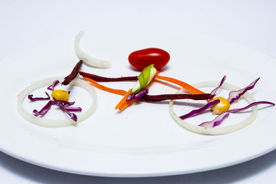 High angle view of multi colored candies on white table