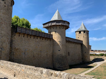 Low angle view of historic building against sky