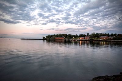 Scenic view of sea against cloudy sky