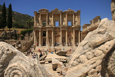Low angle view of old ruins against clear sky