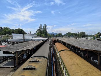 Train on railroad tracks against sky