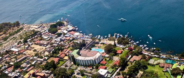 High angle view of city by sea