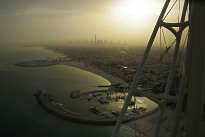 High angle view of city buildings during sunset