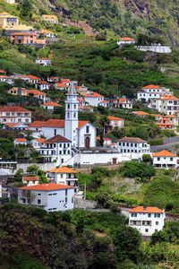 High angle view of buildings in village