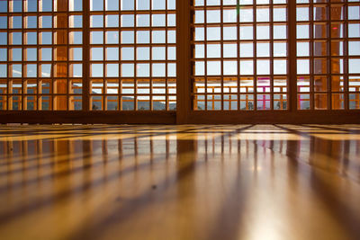 Reflection of window on glass floor