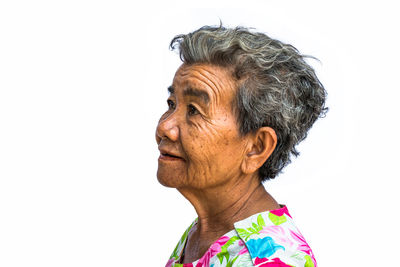 Portrait of woman against white background