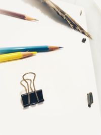 Close-up of pencils against white background