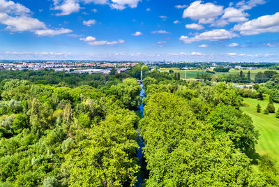 Scenic view of green landscape against sky