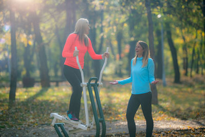 Exercising in fall in outdoor gym.