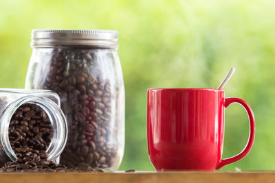 Close-up of coffee in jar on table