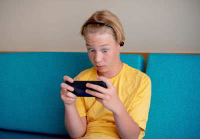 Young woman using mobile phone
