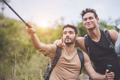 Portrait of smiling young man outdoors