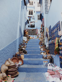 High angle view of steps amidst buildings in city