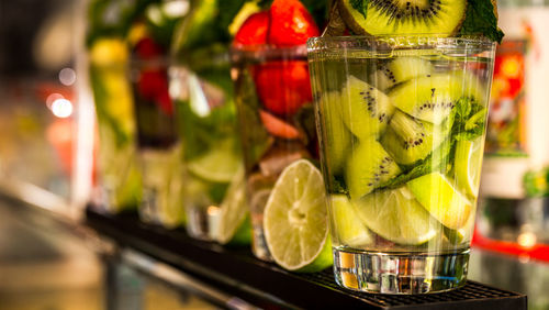 Close-up of fruits in glass jar on store