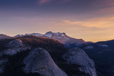 Scenic view of mountains against sky during sunset