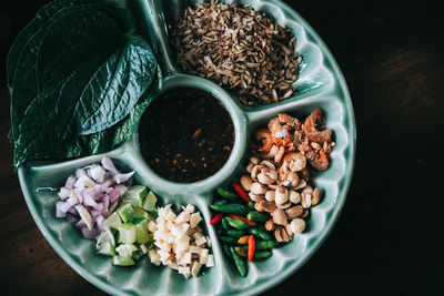 High angle view of chopped vegetables in bowl on table