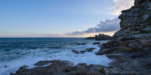 Scenic view of sea against sky during sunset