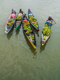 High angle view of people on boat in river