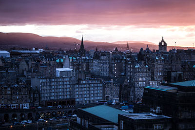 High angle view of buildings against sky at sunset