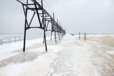 Scenic view of sea against sky during winter