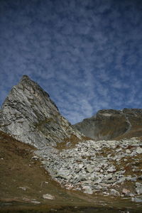 Scenic view of rocky mountains against sky