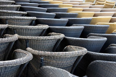Full frame shot of empty wicker chairs for sale in store