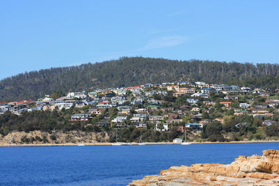 Cityscape with mountain range in background