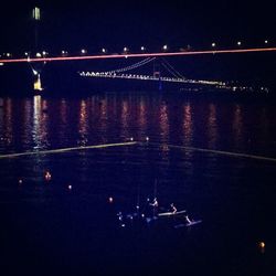 Reflection of illuminated buildings in water