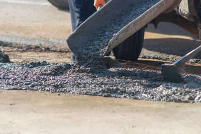 Low section of man working at construction site