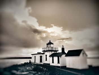 Low angle view of historic building against cloudy sky